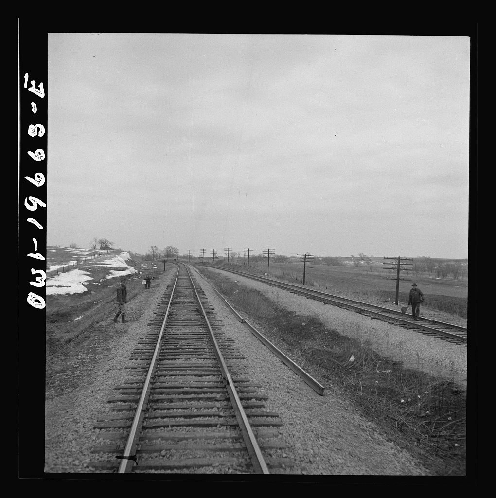 Untitled photo, possibly related to: Carrollton (vicinity), Missouri. A section gang at work along the Atchison, Topeka…