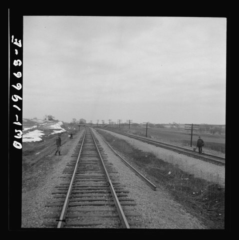Untitled photo, possibly related to: Carrollton (vicinity), Missouri. A section gang at work along the Atchison, Topeka…