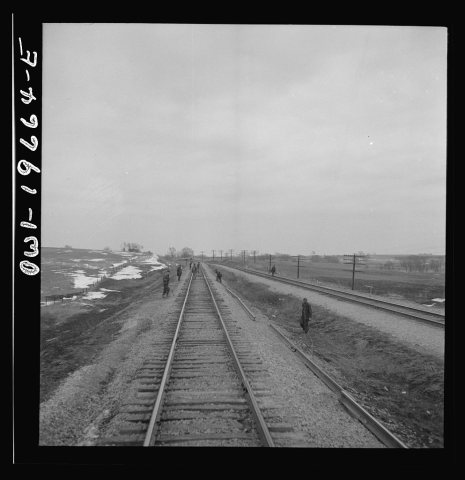 Carrollton (vicinity), Missouri. A section gang at work along the Atchison, Topeka, and Santa Fe Railroad between Marce…