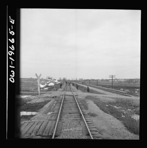 Untitled photo, possibly related to: Carrollton (vicinity), Missouri. A section gang at work along the Atchison, Topeka…