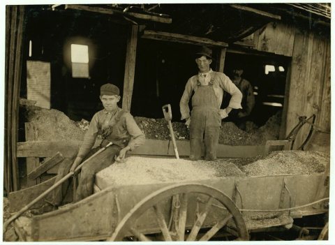 A Boy (may be over 14) at Heavy Work. Shoveling Ore at Daisy Bell Mine