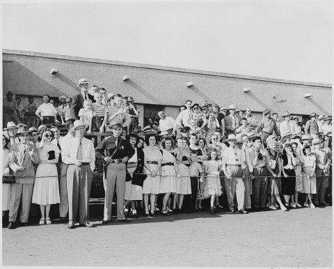 A crowd of people gathered at the train station at Bolivar, Missouri, waiting to see President Harry S. Truman, who... …