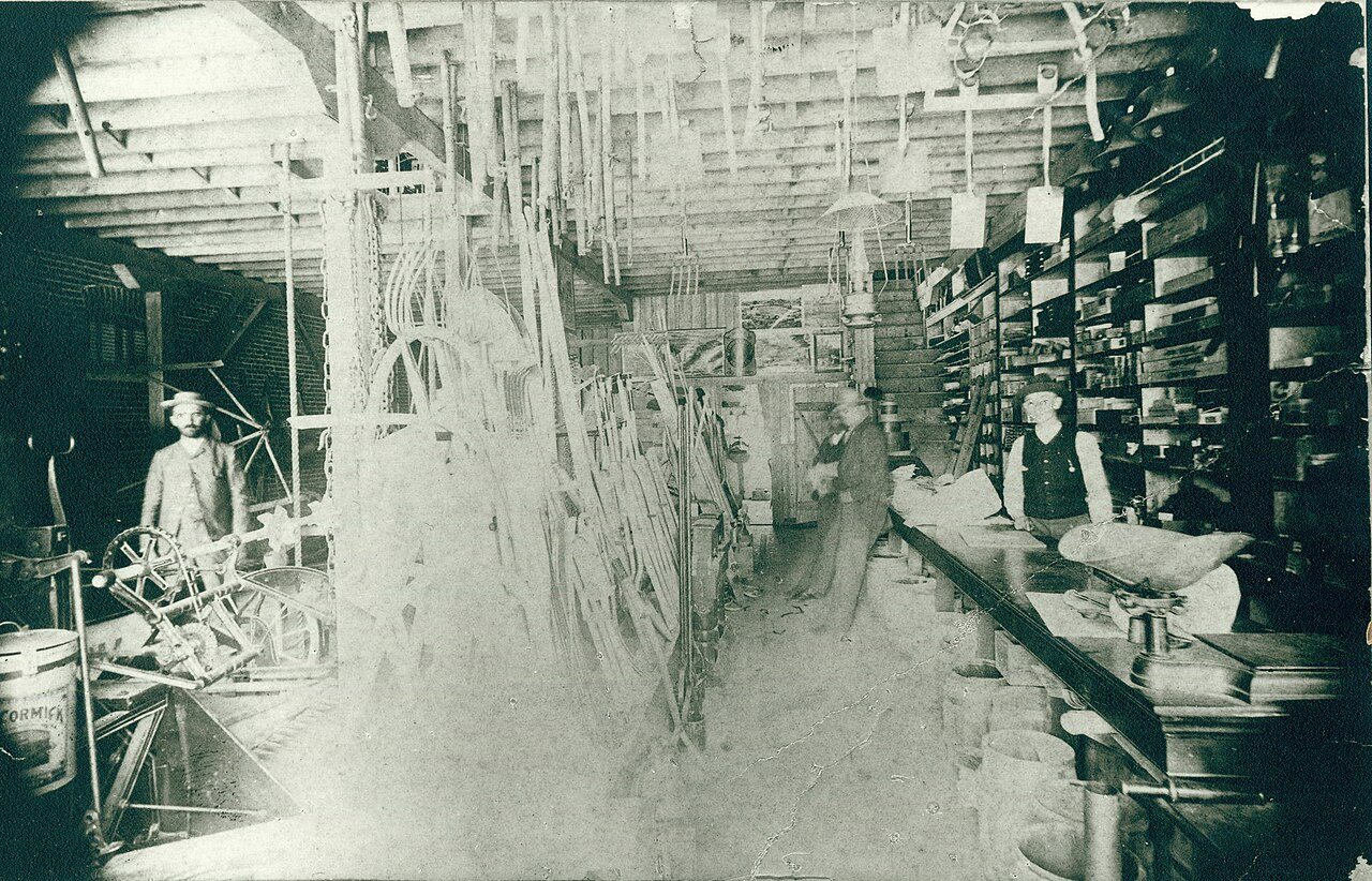 E.G. Busch Hardware Store, Washington, MO. Busch, aged 25, behind counter