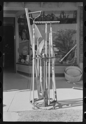 Garden tools in front of hardware store