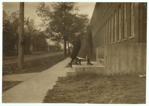 Young girls going to work in Friedman Shelby Shoe Company, 6:30 A.M. Location: Mexico, Missouri