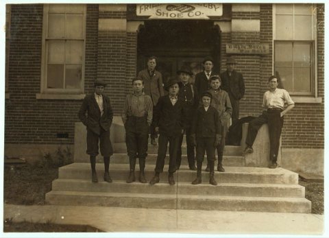 Group of boys working in Freidjman [i.e., Friedman] Shelby Shoe Company, 6:30 A.M. (See photo #1718 for names of boys.)…