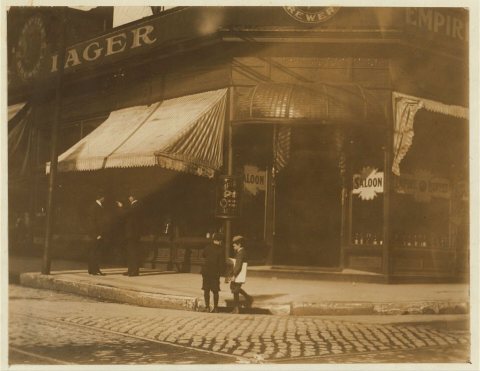 Saloon and boys selling. Location: St. Louis, Missouri