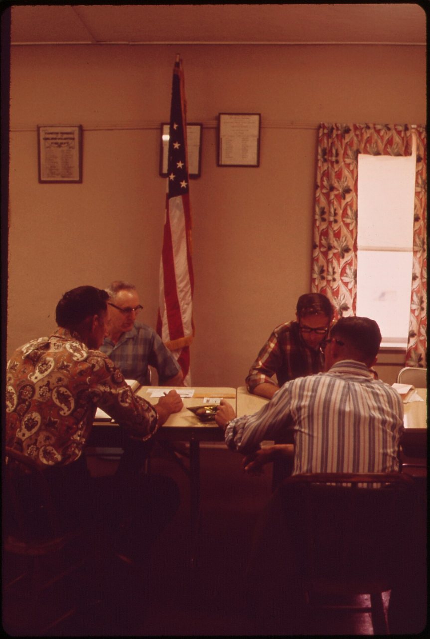 MEMBERS OF THE GARLAND VILLAGE BOARD HOLD MONTHLY MEETING IN A ROOM ABOVE THE VOLUNTEER FIRE DEPARTMENT