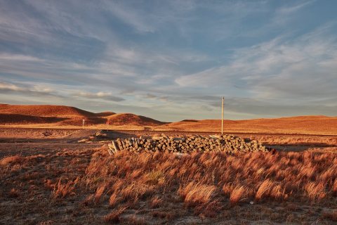 Rail ties stacked near some desolate tracks near Mullen in Hooker County, within the vast Nebraska sandhills