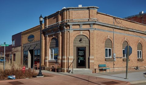 A historic bank building, now (as of 2021) a coffee shop fittingly called the Medina Street Vault