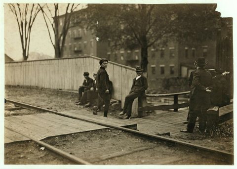6:30 A.M. May 19, 1909. One of the small boys going into Mill No. 1, Great Falls Mfg. Co