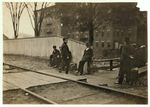 6-30 A.M. May 19, 1909. One of the small boys going into Mill No. 1, Great Falls Mfg. Co., Somersworth, N.H. Saw 6 goin…