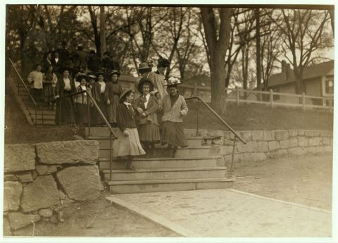 Young girls going to work after noon hour, May 18, 1909, in Great Falls Mfg. Co