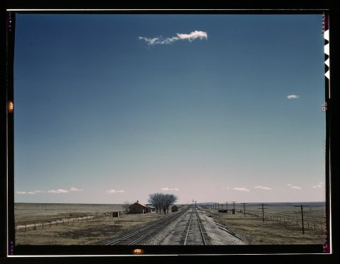 Passing a section house along the Atchison, Topeka, and Santa Fe railroad1a34731v