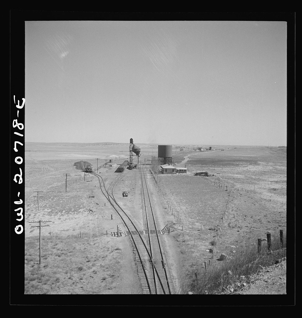 Vaughn, New Mexico. Passing the Southern Pacific Railroad station along the Atchison, Topeka and Santa Fe Railroad betw…