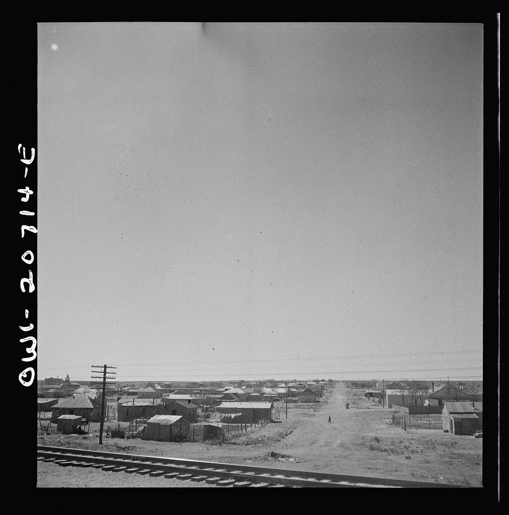 Vaughn, New Mexico. Passing through the town on the Atchison, Topeka and Santa Fe Railroad yard between Vaughn and Bele…