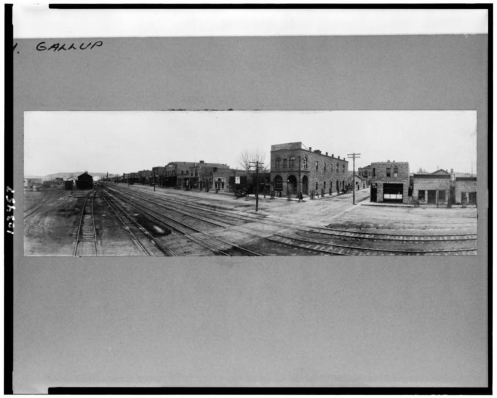 View of railroad yard and city buildings