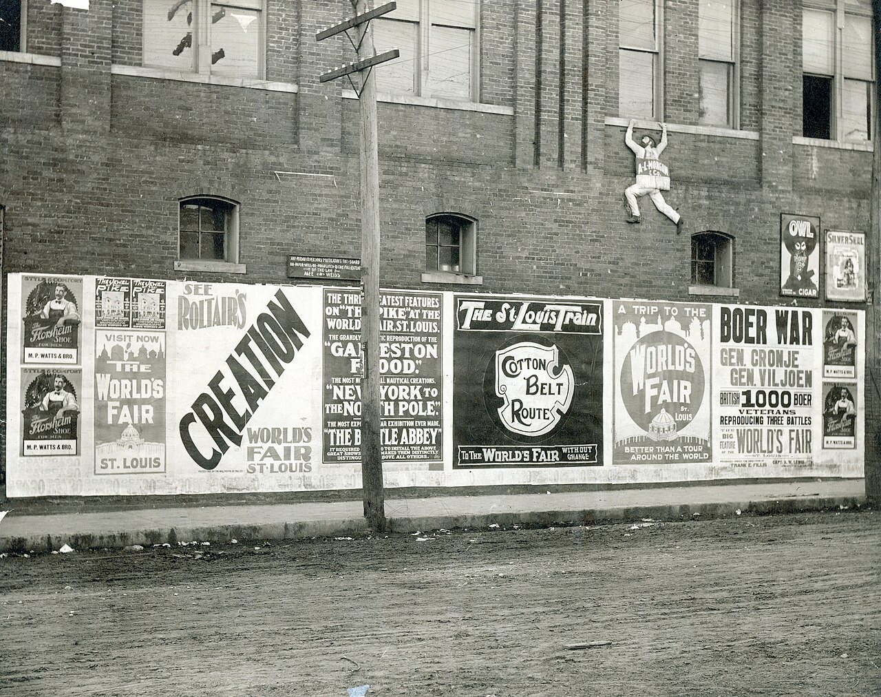 Billboard in Camden, Arkansas advertising attractions at the 1904 World's Fair in St. Louis