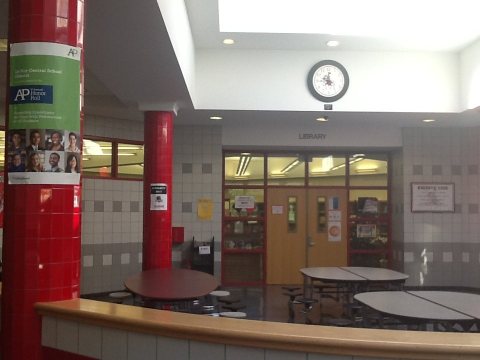Atrium shot of library and den
