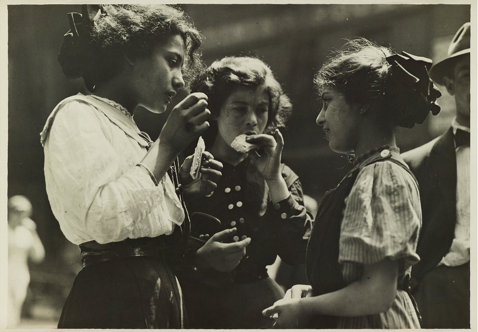 Noon in East Side factory district, New York, 1912
