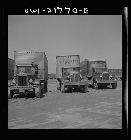 Untitled photo, possibly related to: Burlington, North Carolina. Brown truck at the terminal of the Associated Transpor…