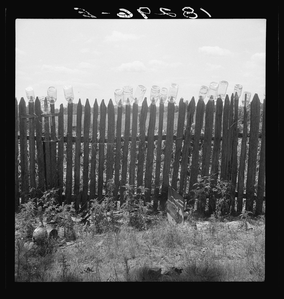 Untitled photo, possibly related to: Fruit jars being sterilized on old lady Graham's back fence in berry season. Near …