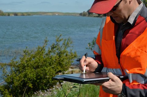 Inspecting a Sacramento River levee