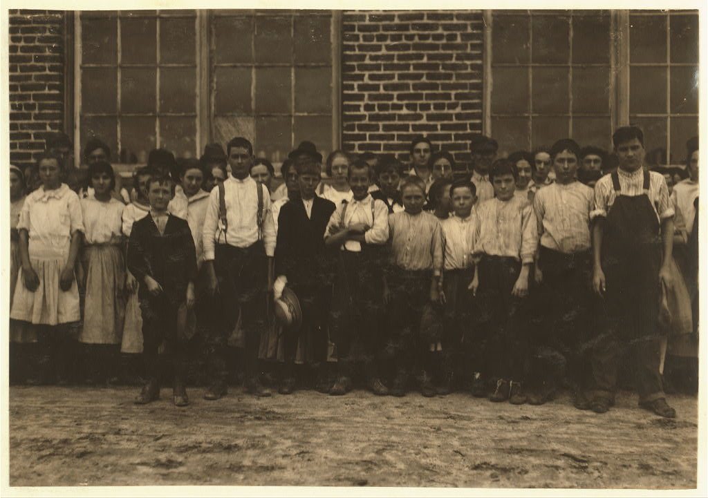 Shaw Cotton Mills. Overseer grouped all the workers, and several of them are surely under 13, and several began work un…
