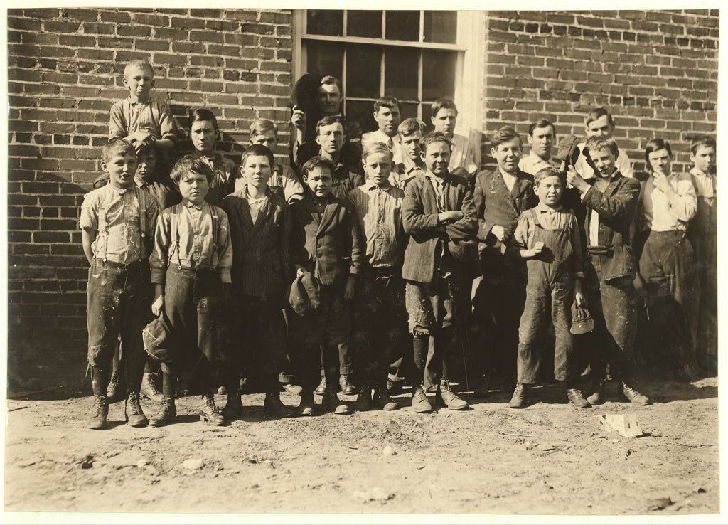 Shaw Cotton Mills. Overseer grouped all the workers, and several of them are surely under 13, and several began work un…