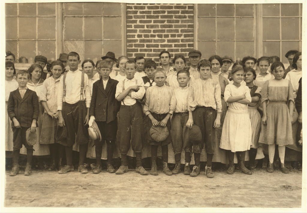 Shaw Cotton Mills. Overseer grouped all the workers, and several of them are surely under 13, and several began work un…