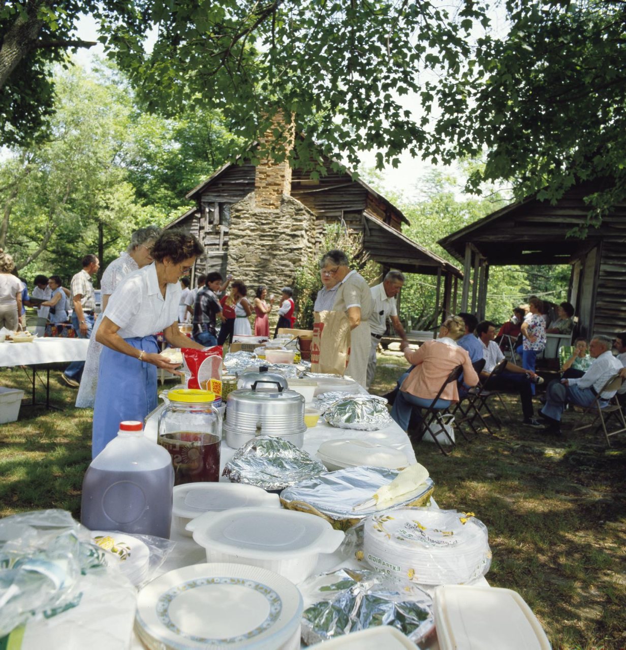 Preparing the food table at a family reunion
