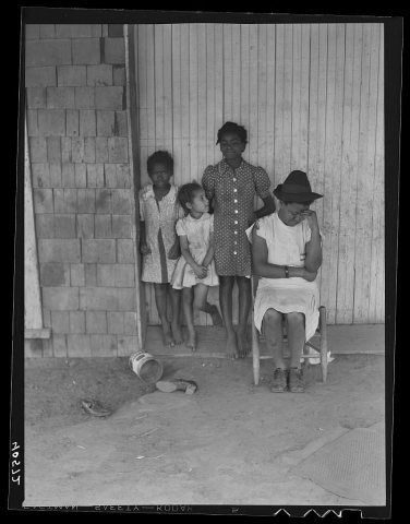 Untitled photo, possibly related to: Some of the people living in an old garage converted into a dwelling. Outskirts of…