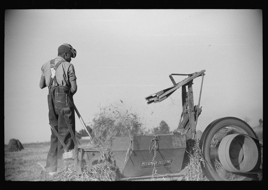 Baling hay on the Mary E. Jones place of about 140 acres. The sons W.E. and R.E. Jones own ninty-nine and sixty acres r…
