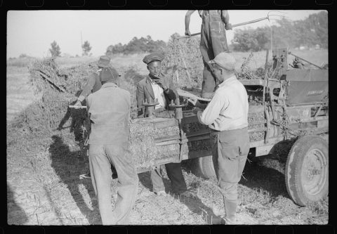 Baling hay on the Mary E. Jones place of about 140 acres. The sons W.E. and R.E. Jones own ninty-nine and sixty acres r…
