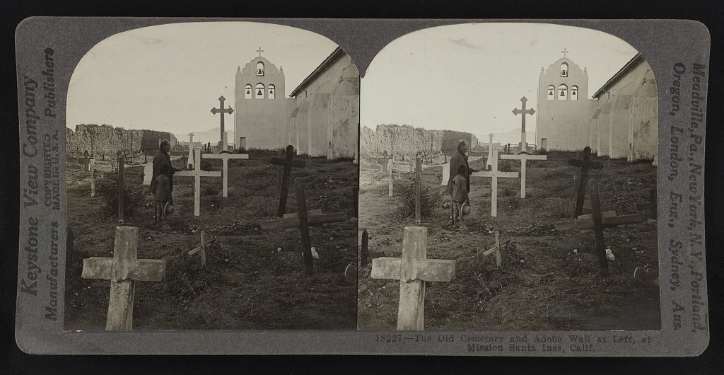 The old cemetery and adobe wall at left, at Mission Santa Inés, Calif