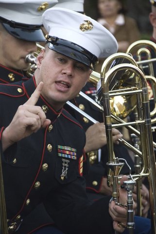 Defense.gov News Photo 101009-M-9613D-005 - U.S. Marine Corps Sgt. Juan Fernandez with the 1st Marine Division Band tal…