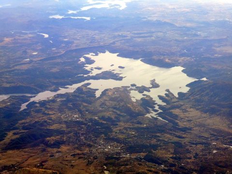 Aerial view of New Melones Lake and Angels Camp, December 2023