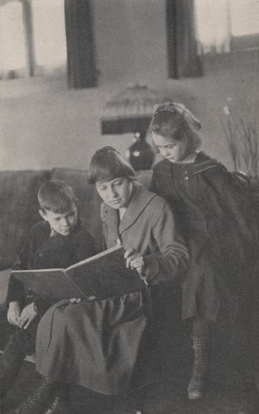 First School Teacher Reading to Students in