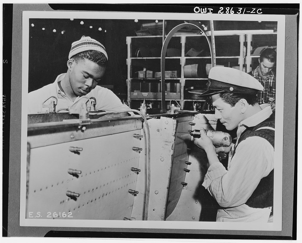 The six plane factories of the Douglas Aircraft Company have been termed an industrial melting pot, since men and women…