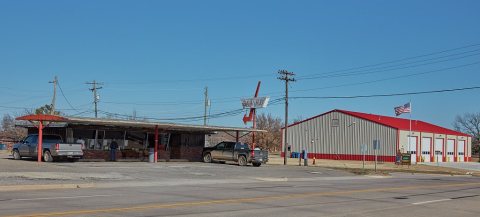 The metal sunroof over the Dairy Hut in the town of Yale, Oklahoma, is no doubt appreciated at this ice-cream stand on …