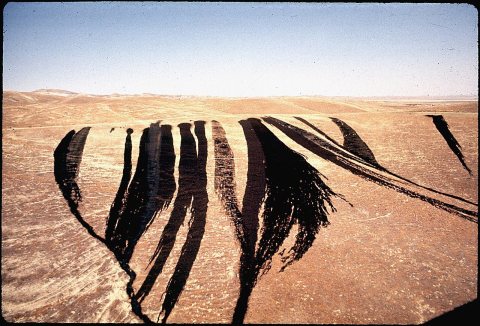 OIL WASTE ON BARREN HILLSIDE