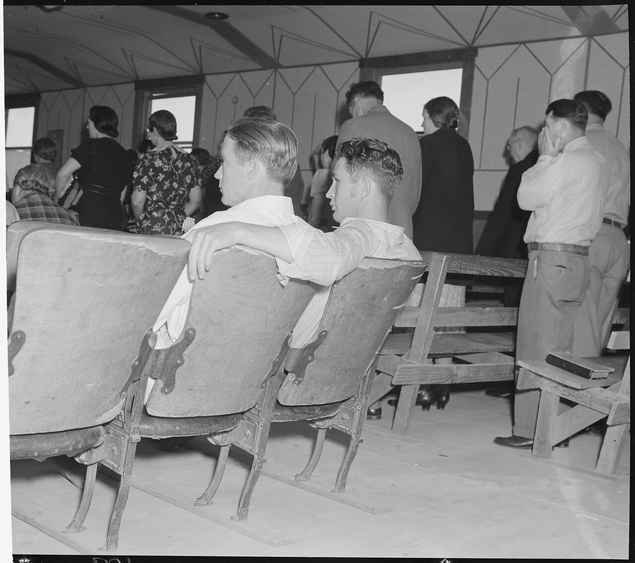 McFarland, Kern County, California. Rural youth, Religion. Two young migrants in a Pentecostal Church. The adults in...…