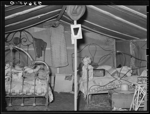 Child of agricultural day laborer in tent home near Spiro, Oklahoma. Sequoyah County