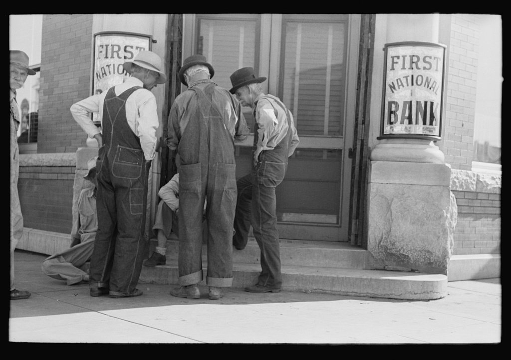 Men in front of bank