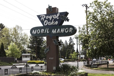 Sign for the Royal Oaks Mobil (sic) Manor, a trailer park