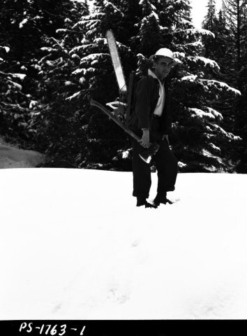 1958. Peter Orr with equipment used to collect hibernating budworm samples. Sumpter, Oregon