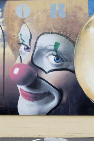 Detail of clown face on Performing Arts mural by Randy Spicer