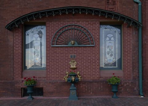 One facade of a beautiful, historic, and unusual Victorian-style mansion