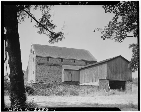 GENERAL VIEW. HOLES IN THE BOTTOM PART OF THE STONE WALL SHOW WHERE REST OF OVERHANG WAS - Stone Barn, Mount Pleasant R…