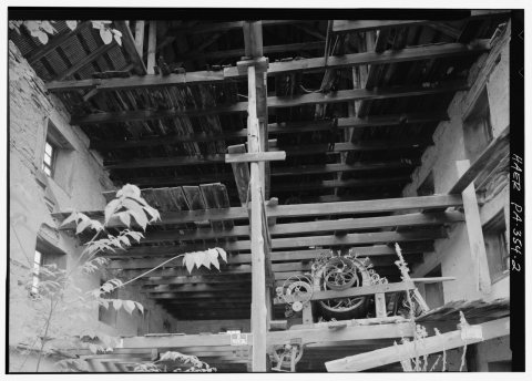 VIEW OF MILL SHOWING THE EXPOSED INTERIOR FRAMING; ON THE RIGHT IS A CARDING MACHINE - Lutz Woolen Factory, 1 mile Sout…